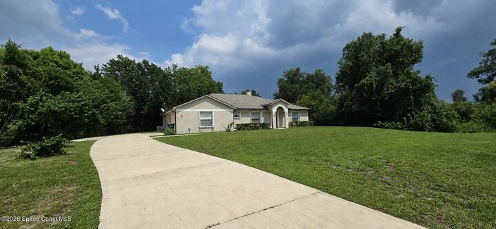 Property Photo:  3835 Alan Shepard Avenue  FL 32931 