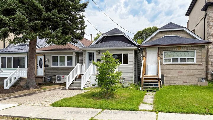 Property Photo: 65 Eldon Avenue ON M4C 5G2