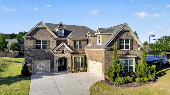 Property Photo:  5625 Turnbridge Pass  GA 30040 