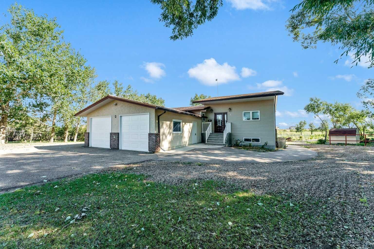 Property Photo: 11418 Eagle Butte Road 7 AB T1B 0H9