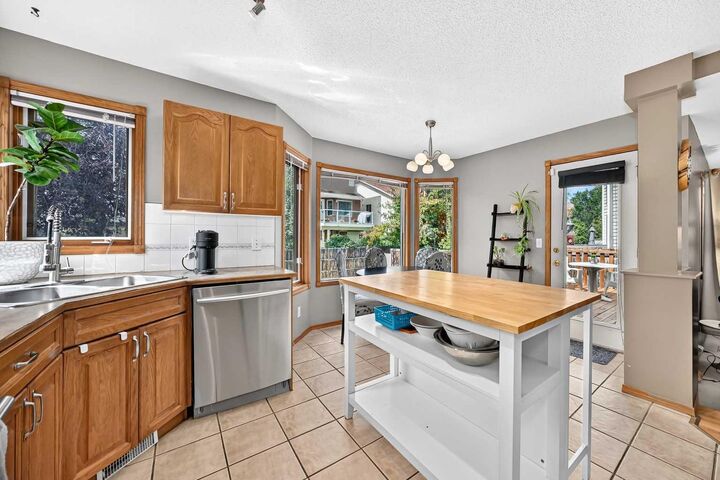 Property Photo:  228 Arbour Ridge Way NW  AB T3G 3Z3 