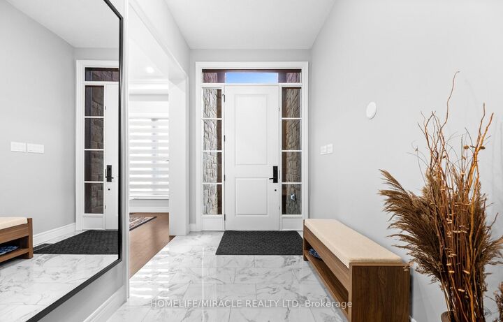 147 Ambrous Crescent W — photo 1