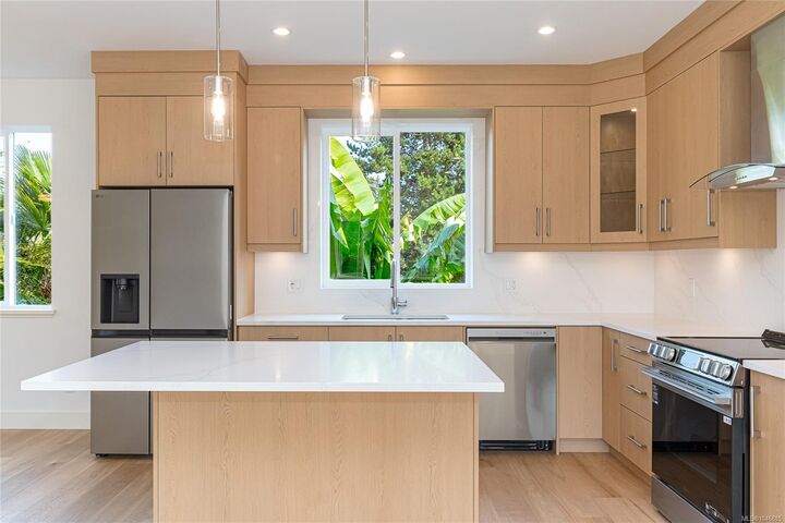 Property Photo: 1559 Ash Rd #1 BC V8N 2S9