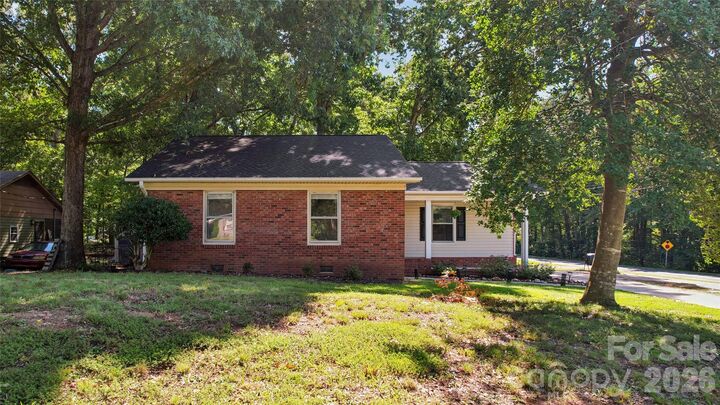 Property Photo:  611 Woodland Drive  NC 28138 