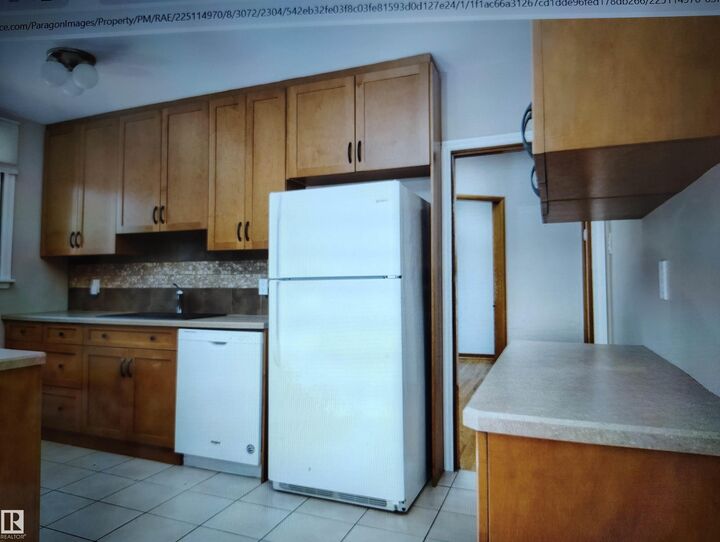 Property Photo:  11730 125 Street NW  AB T5M 0N6 