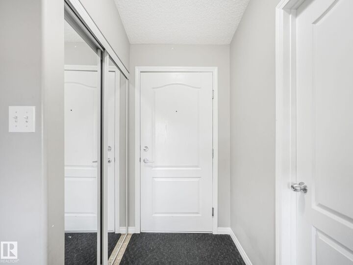 Property Photo:  9363 Simpson Drive NW 1437  AB T6R 0N2 