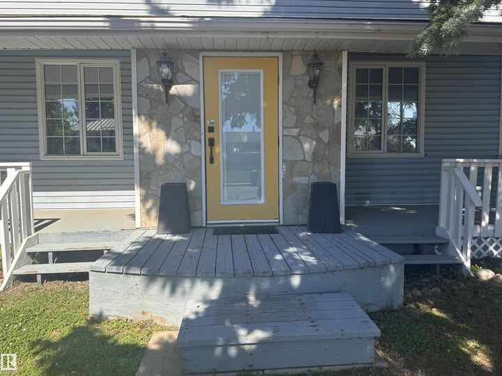 Property Photo:  9828 110 Street  AB T7P 1P6 