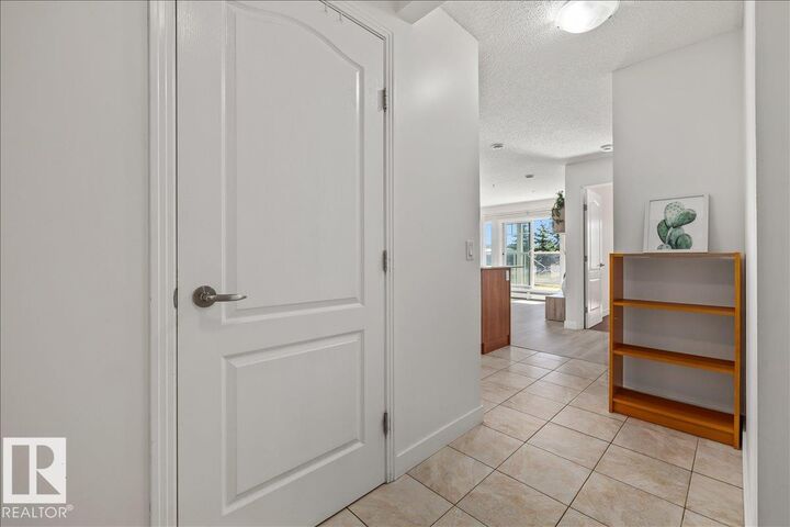 Property Photo:  12660 142 Avenue NW 114  AB T5X 0J5 