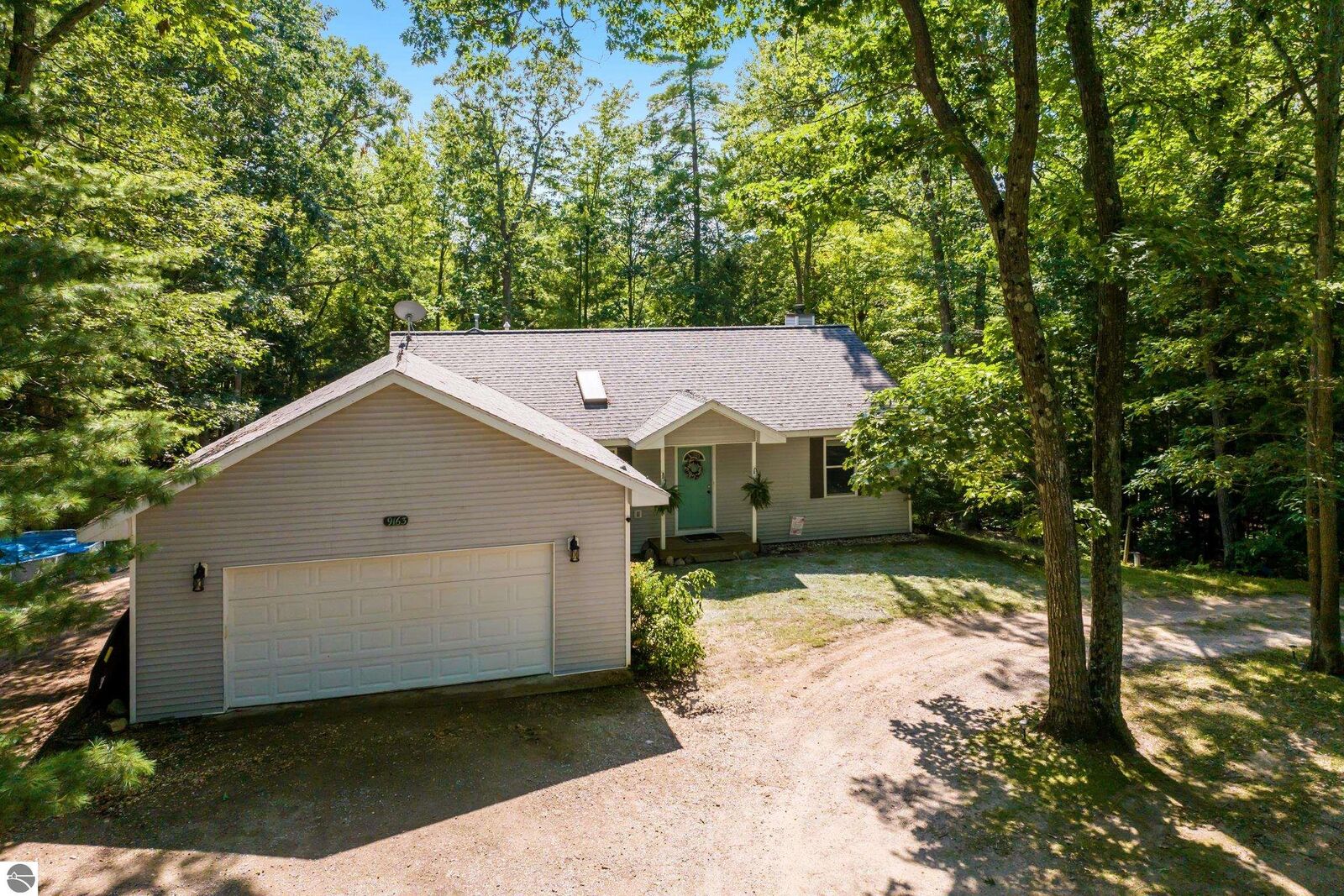 Property Photo:  9163 Youker Road  MI 49637 
