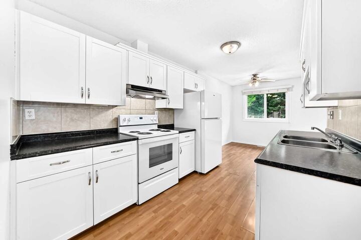 Property Photo:  28 Woodland Drive  AB T4L 1V1 
