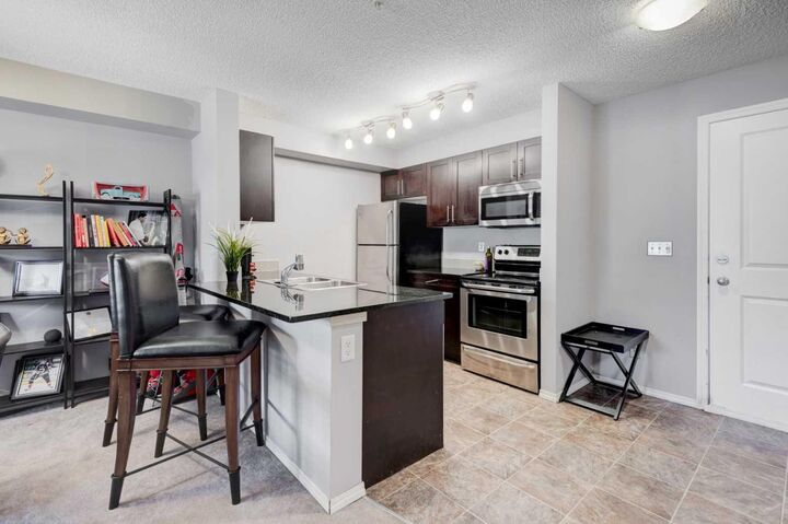 Property Photo:  81 Legacy Boulevard SE 3319  AB T2X 2B9 