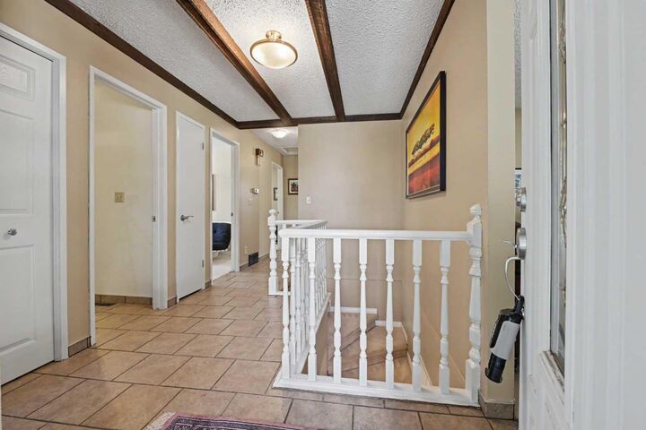Property Photo: 231 Cedarille Green SW AB T2W 2H3