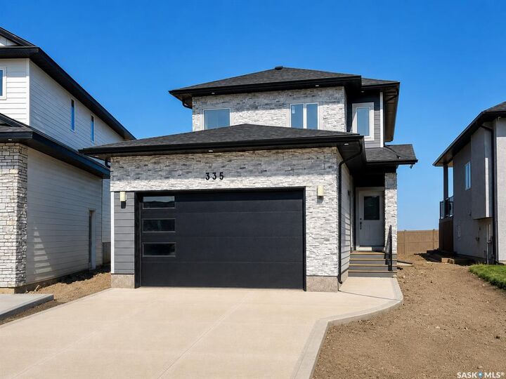 Property Photo: 335 Sharma Crescent SK S7W 1J1