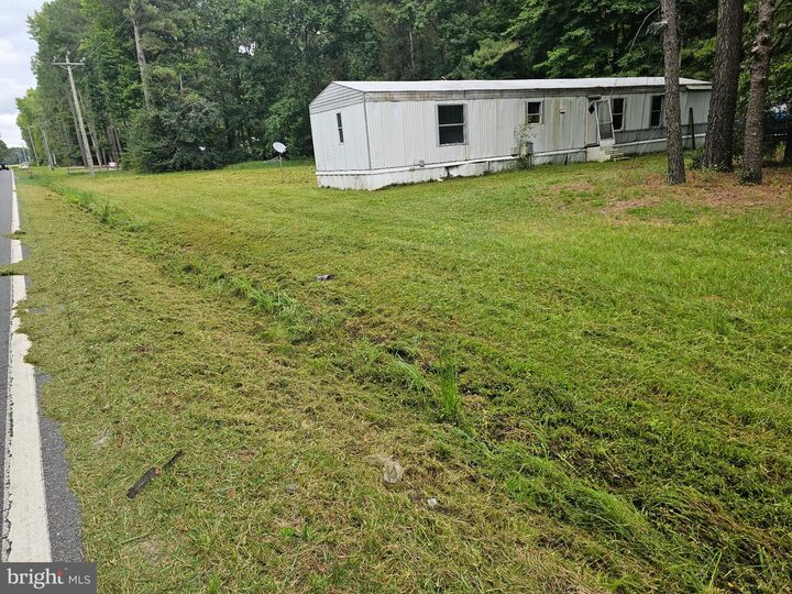 Property Photo:  28597 Woodcrest Drive  DE 19951 