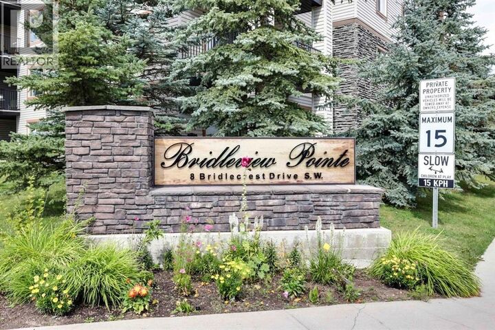Property Photo: 8 Bridlecrest Drive Southwest AB T2Y 0H6