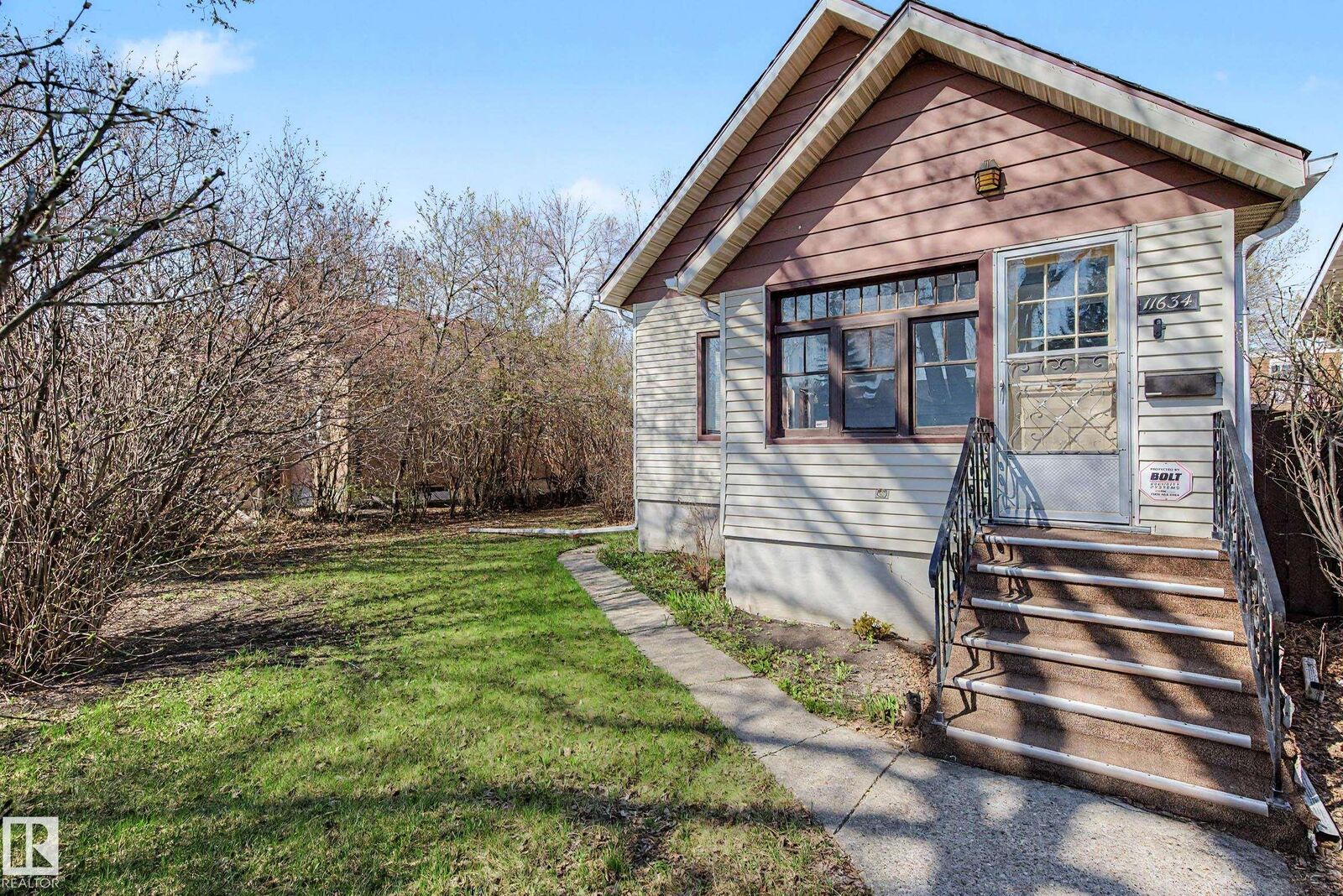 Property Photo:  11634 123 Street NW  AB T5M 0G6 