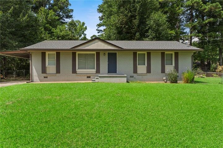 Property Photo:  8839 Channing Drive  GA 30238 