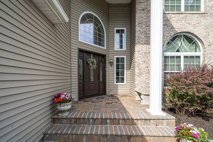 Property Photo:  44 Independence Way  NY 11764 