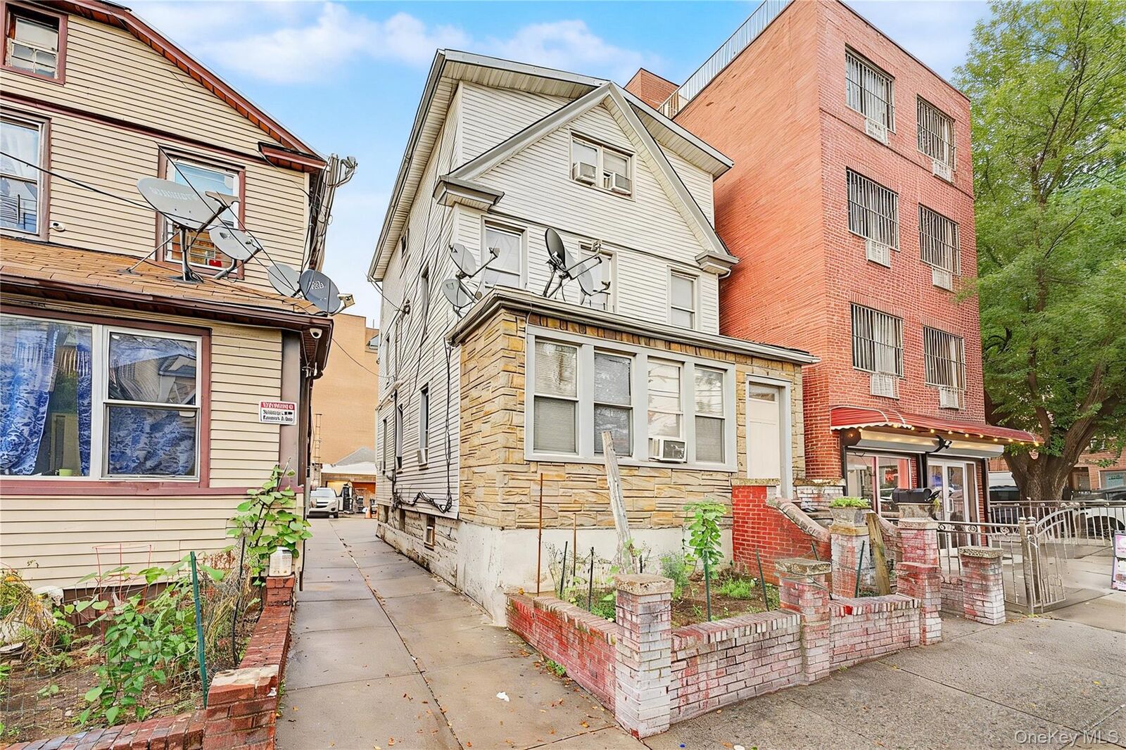 Property Photo:  3727 111 Street  NY 11368 