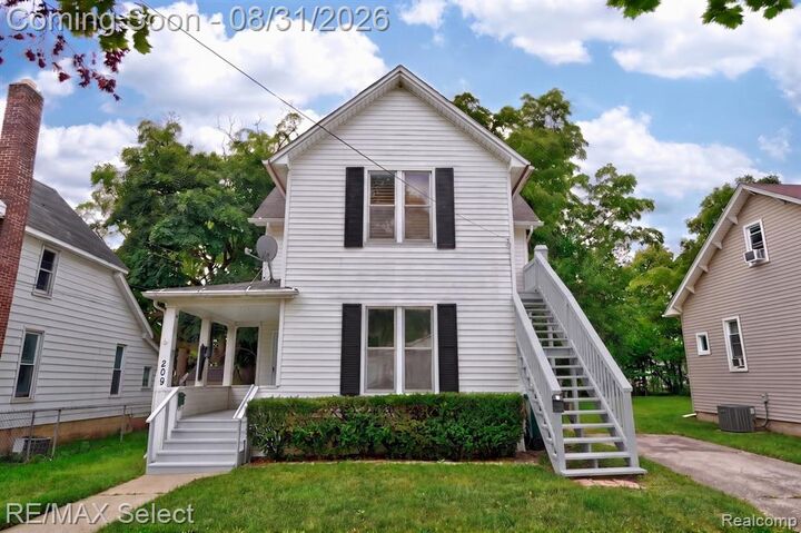 Property Photo:  209 N Cherry Street  MI 48433 1603 
