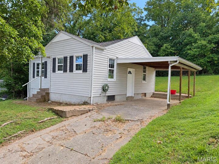 Property Photo:  910 N Sprigg Street  MO 63701 