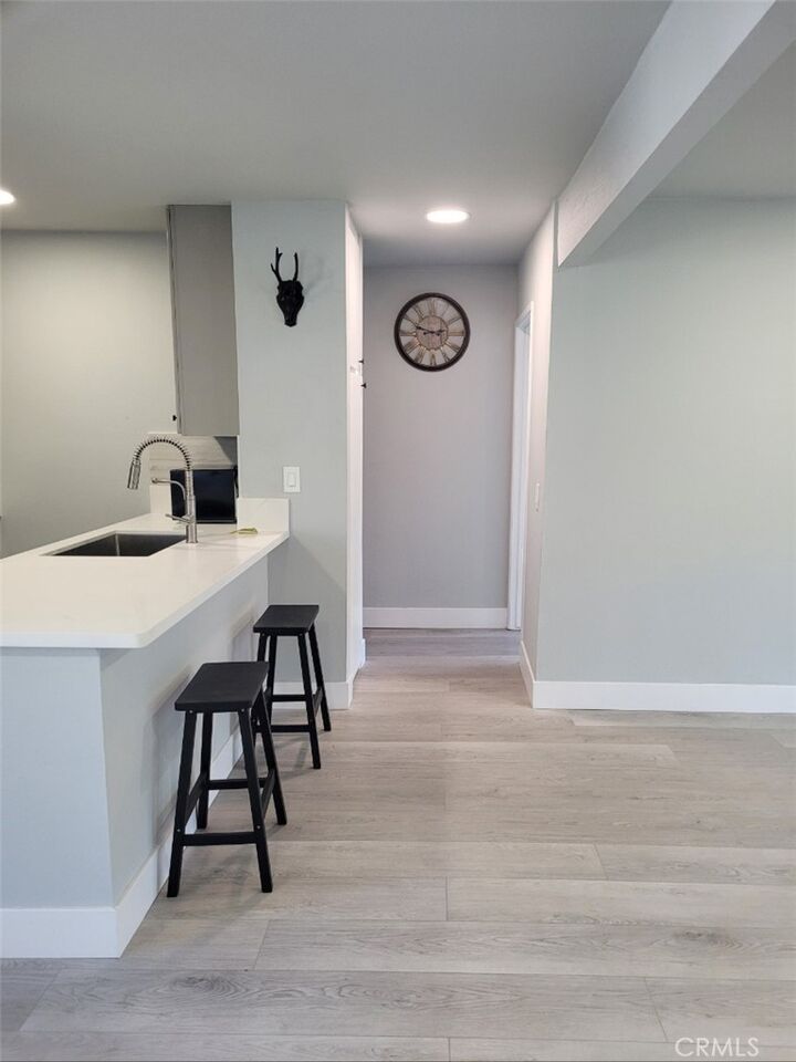 Property Photo: 15233 Santa Gertrudes Avenue V104 CA 90638