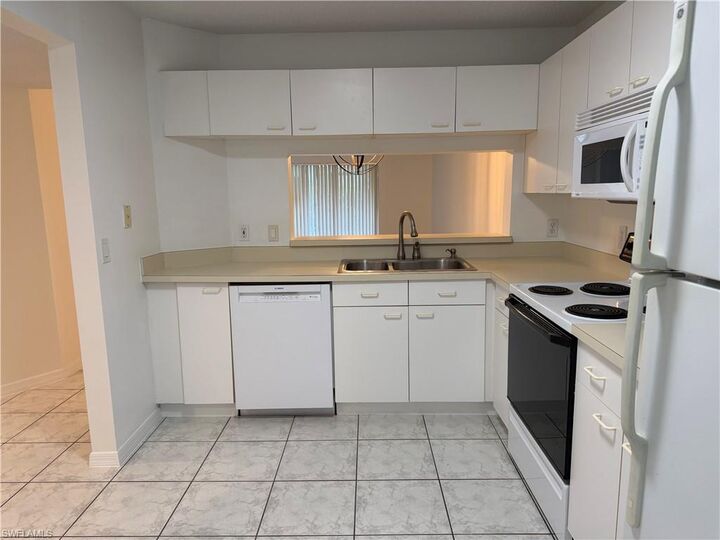 Property Photo:  7755 Jewel Ln 103  FL 34109 