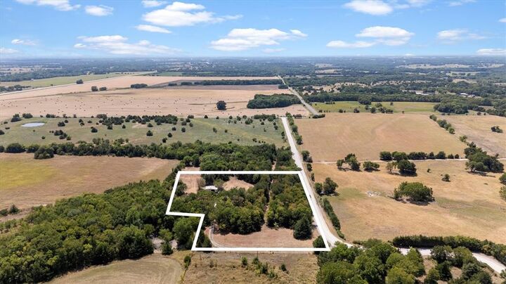 Property Photo: 9999 County Road 936 TX 75409