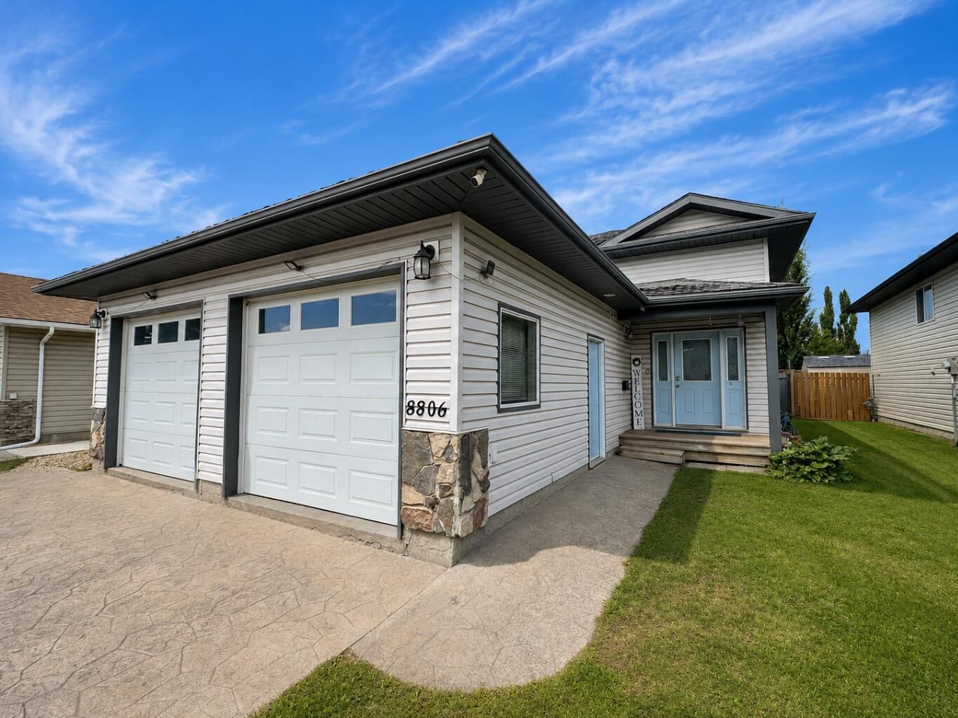 Property Photo:  8806 112 Avenue  AB T8X 1P9 