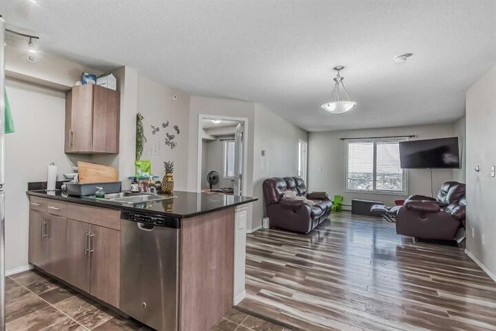 Property Photo:  7110 80 Avenue NE 408  AB T3J 0N4 