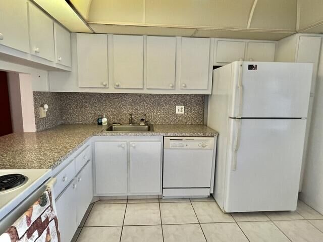 Property Photo:  120 Lake Meryl Drive 220  FL 33411 