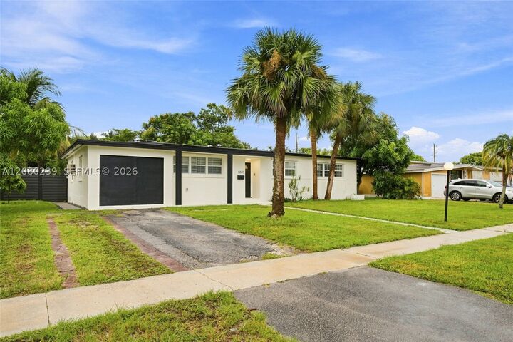 Property Photo:  6885 NW 14th Ct  FL 33313 