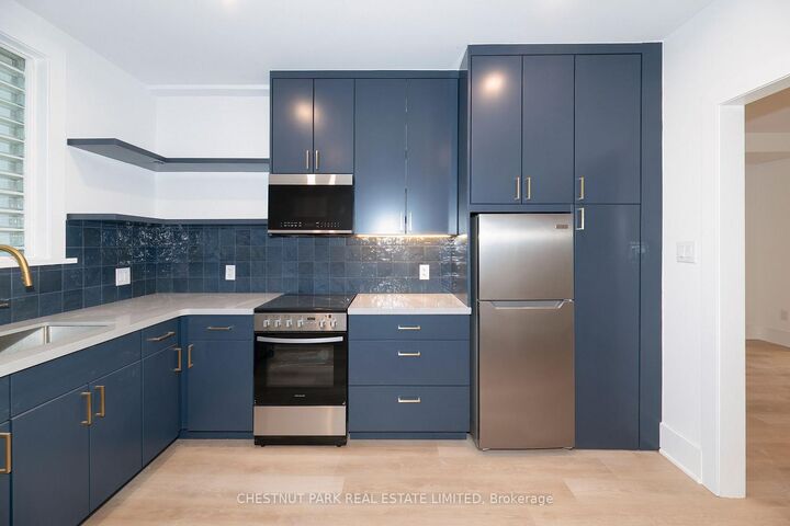 Property Photo:  1105 Queen Street E Main  ON M4M 1K7 