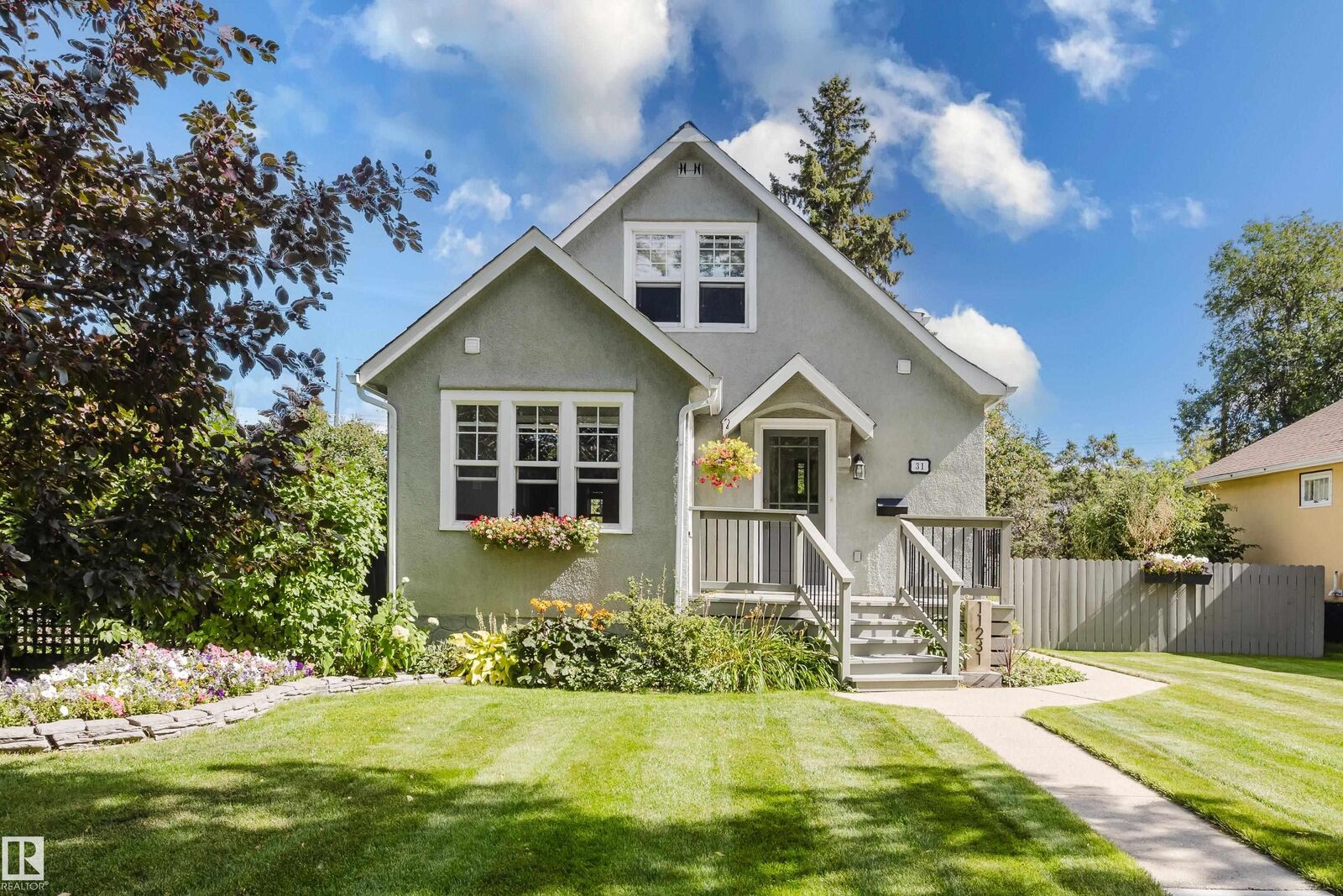 Property Photo:  11231 126 Street NW  AB T5M 0R3 