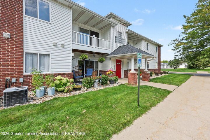 Property Photo:  813 Carom Circle  MI 48854 