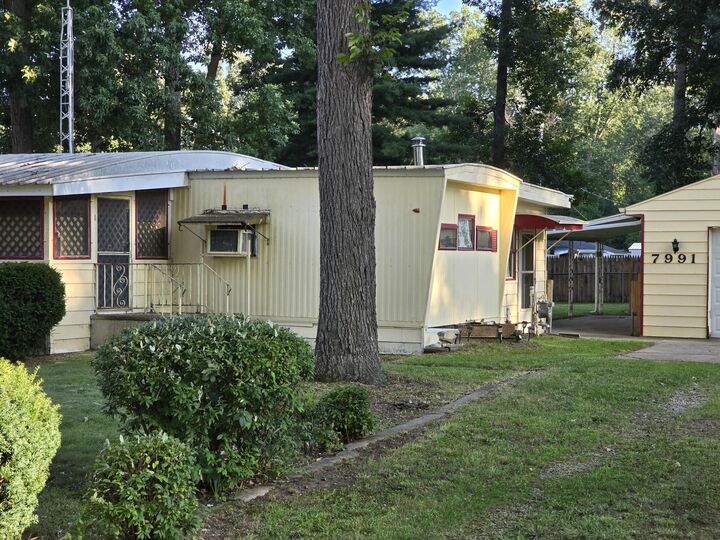 Property Photo:  7991 Ivan Drive  MI 49269 