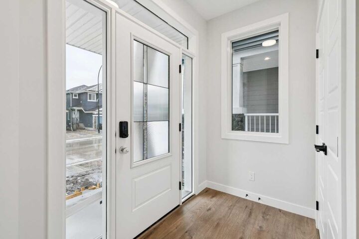 Property Photo:  152 Snowberry Common SE  AB T3M 4G7 