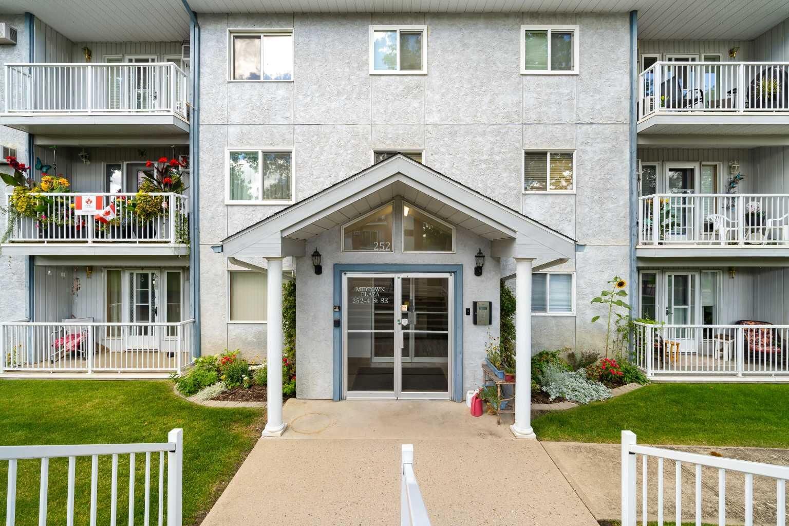 Property Photo:  252 4 Street SE 303  AB T1A 0K1 