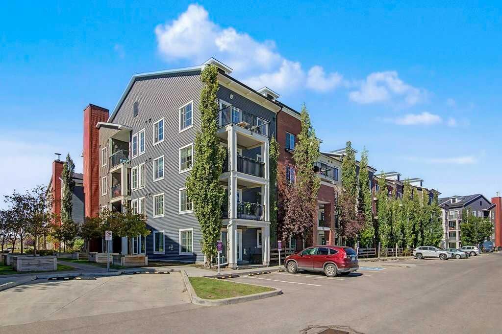 Property Photo:  755 Copperpond Boulevard SE 3210  AB T2Z 4R2 