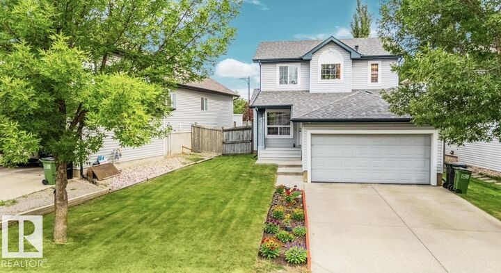 Property Photo:  20324 48 Avenue NW  AB T6M 2Z6 