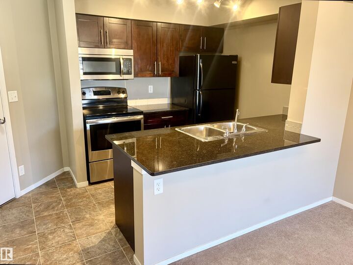 Property Photo:  3207 James Mowatt Trail SW 114  AB T6W 3L6 