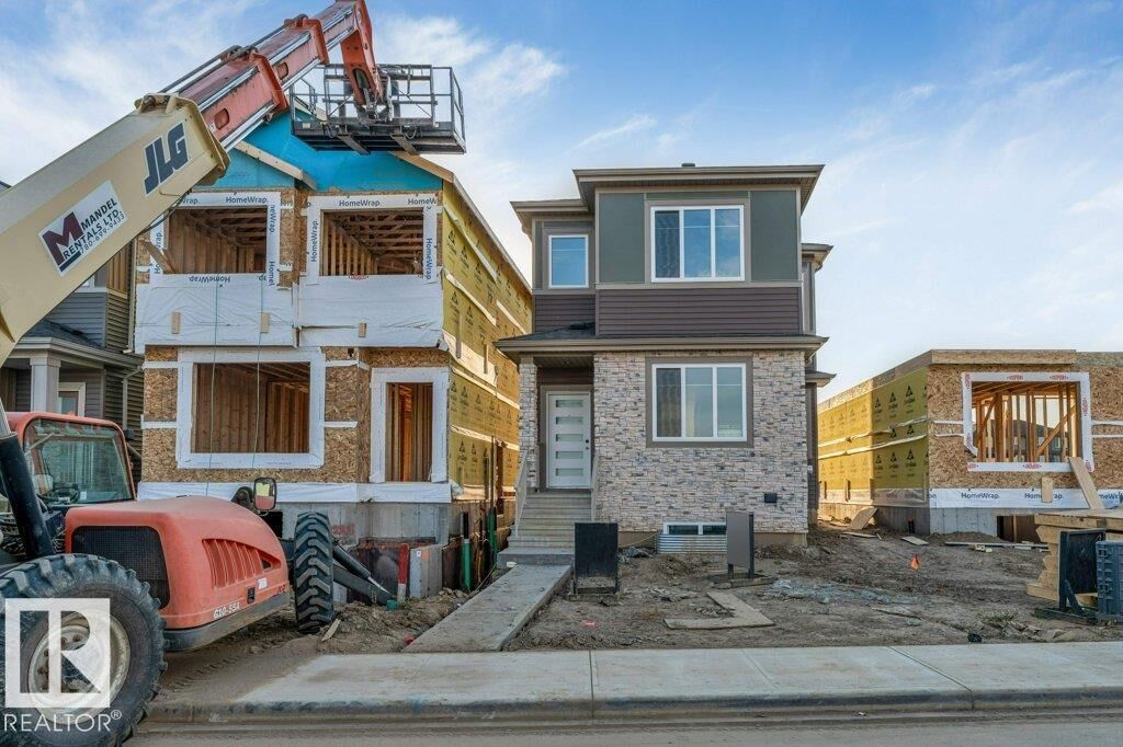 Property Photo:  8412 226 Street NW  AB T5T 7Y8 