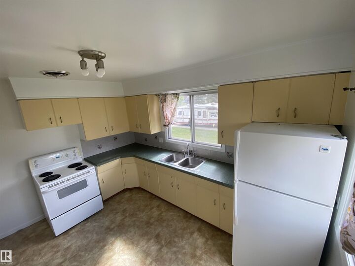 Property Photo:  4818 54A Avenue  AB T9C 1G2 