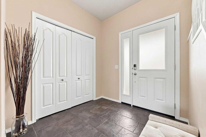 Property Photo:  106 Crystal Shores Manor  AB T1S 2H6 