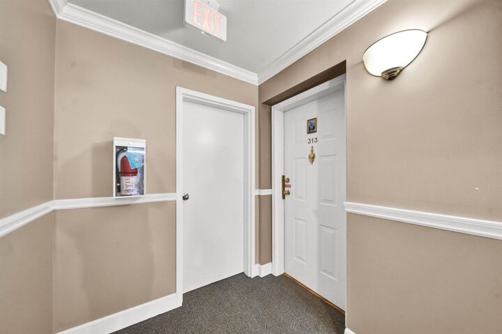 Property Photo: 9763 140 Street 313 BC V3T 4M4