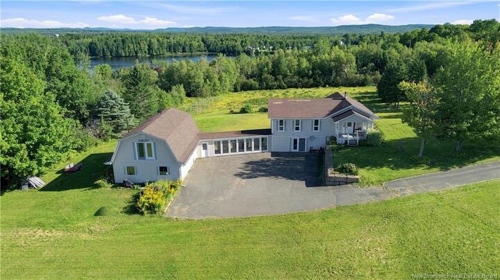 Property Photo: 100 Greenhill Lake Road NB E6E 1E9