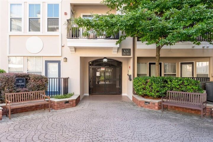 Property Photo:  1850 Cotillion Drive 3419  GA 30338 