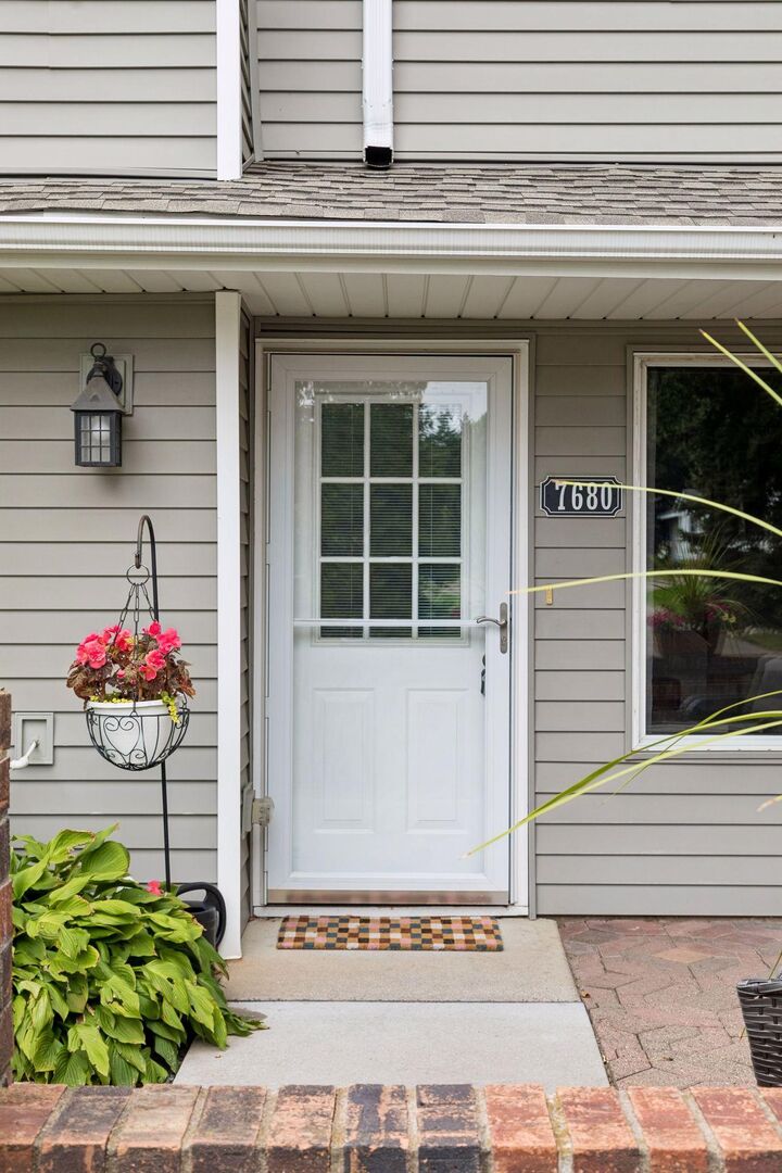 Property Photo:  7680 13th Street N  MN 55128 