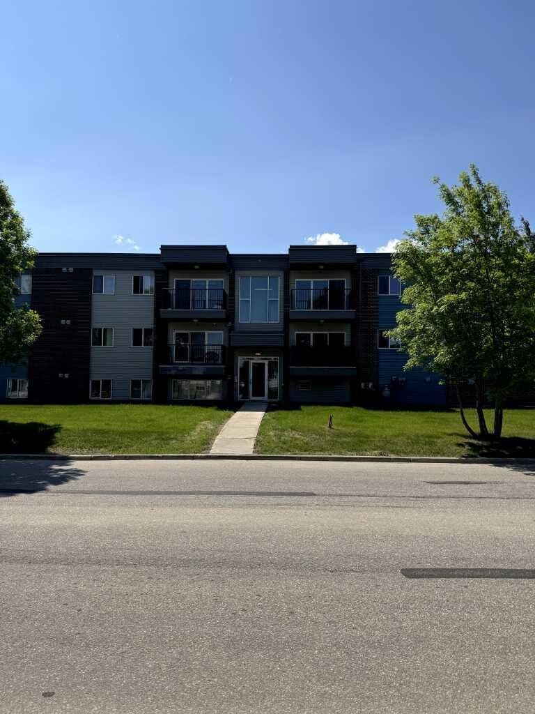 Property Photo:  709 6 Avenue SE 205  AB T0G 2A3 