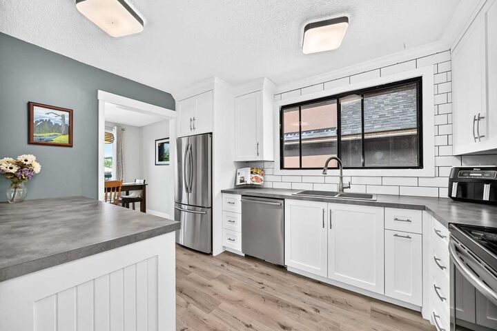 Property Photo:  7731 47 Avenue NW  AB T3B 1Y9 